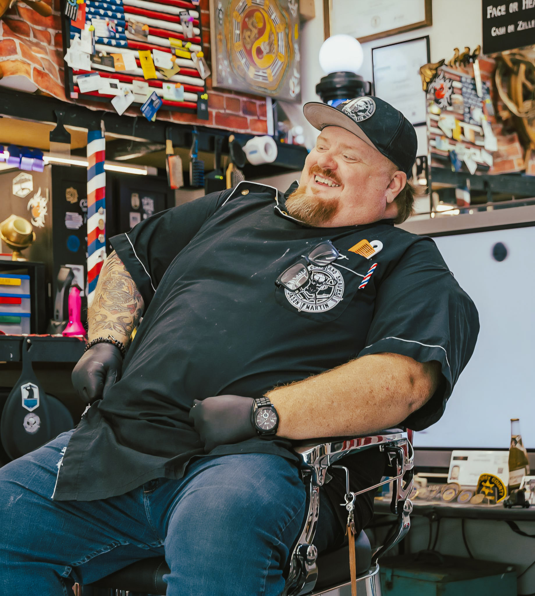Jason Martin at work in the Drop Anchor barber chair